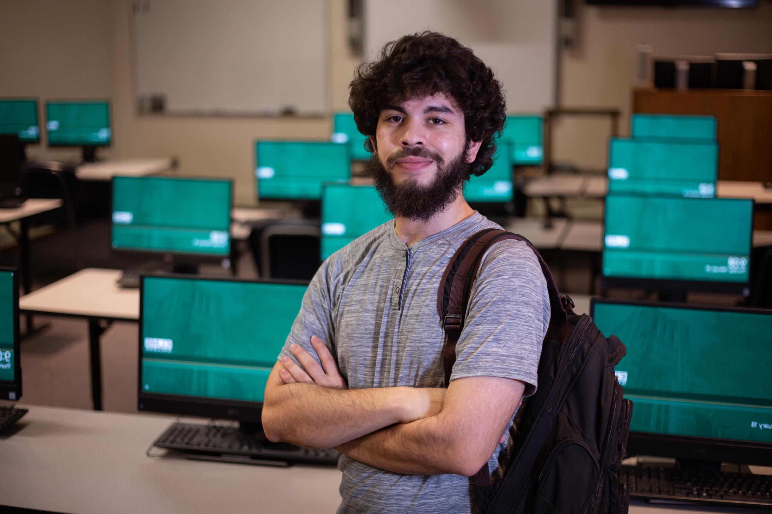 Photo of a student in a computer lab; CITS major; CS major;